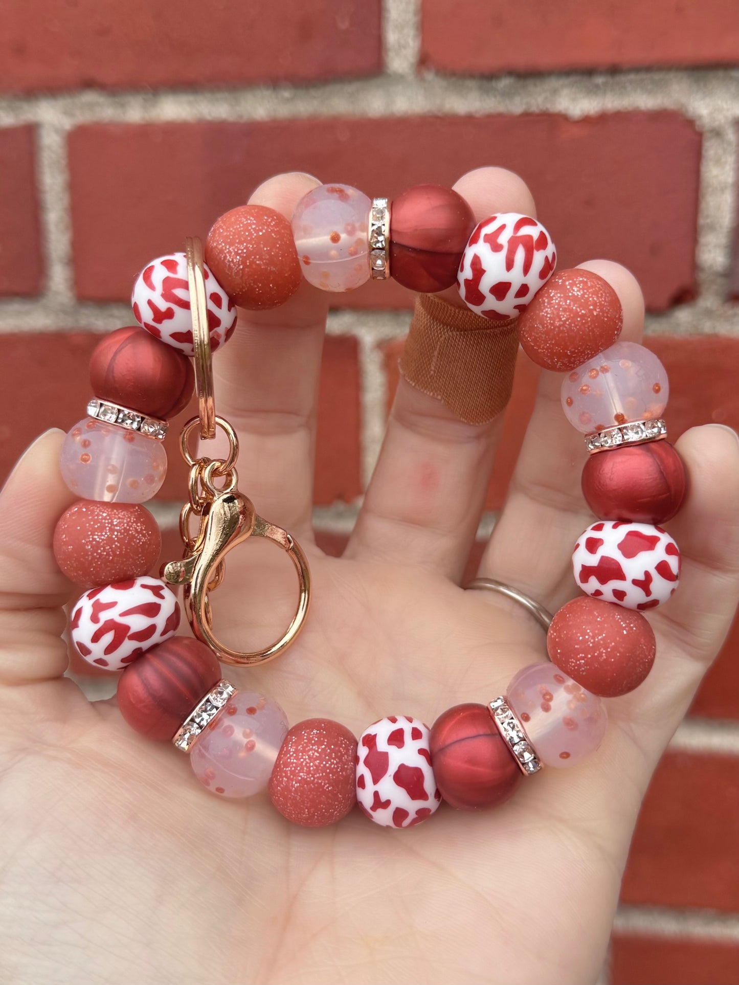 Crimson Rust Cow Wristlet - Original Size M&H