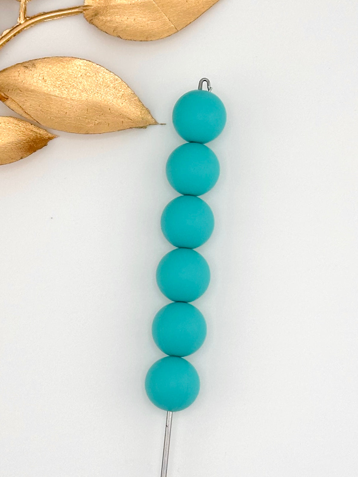 Turquoise solid silicone beads, 12-count pack