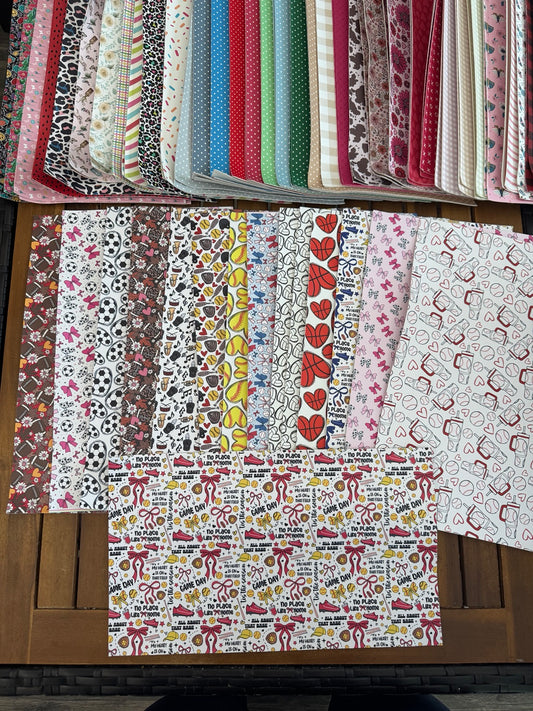 Faux leather sport bundle with assorted sports-themed printed sheets