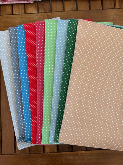 Swiss dot faux leather sheets in nine assorted colors with white dots