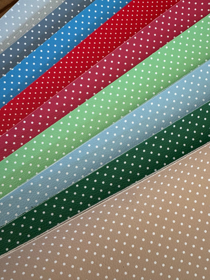 Swiss dot faux leather sheets in nine assorted colors with white dots