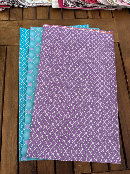 Mermaid faux leather sheets with turquoise and purple scales and seashell patterns