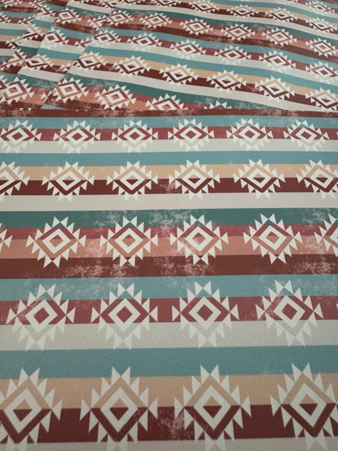 Desert Sunset faux leather sheets with turquoise, rust, beige and cream geometric stripes