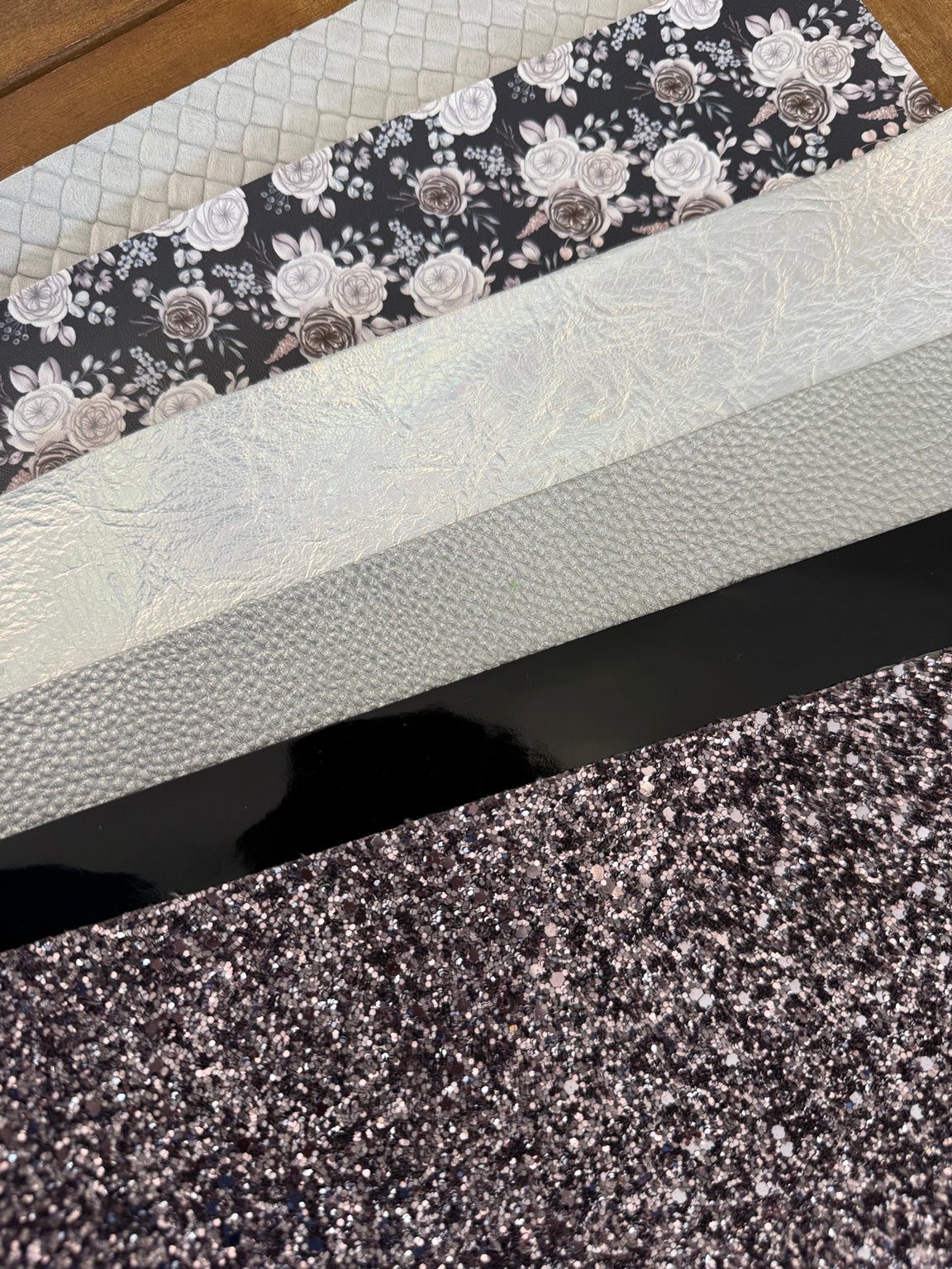 Midnight Pearl faux leather bundle with black floral print, pearly white and silver textures, glossy black and glitter