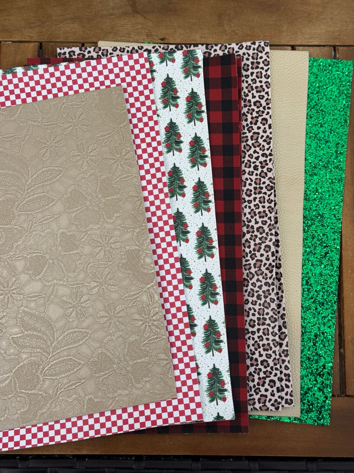Merry and Wild faux leather bundle with Christmas trees, red checks, buffalo plaid, leopard print, cream textures and green glitter