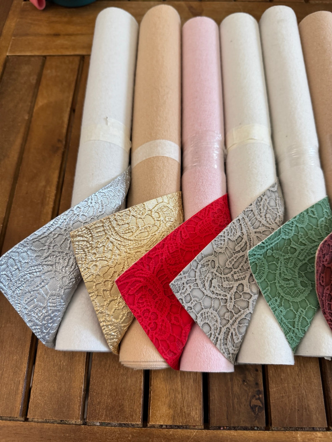 Faux leather lace rolls in assorted metallic, neutral and jewel colors, sold individually