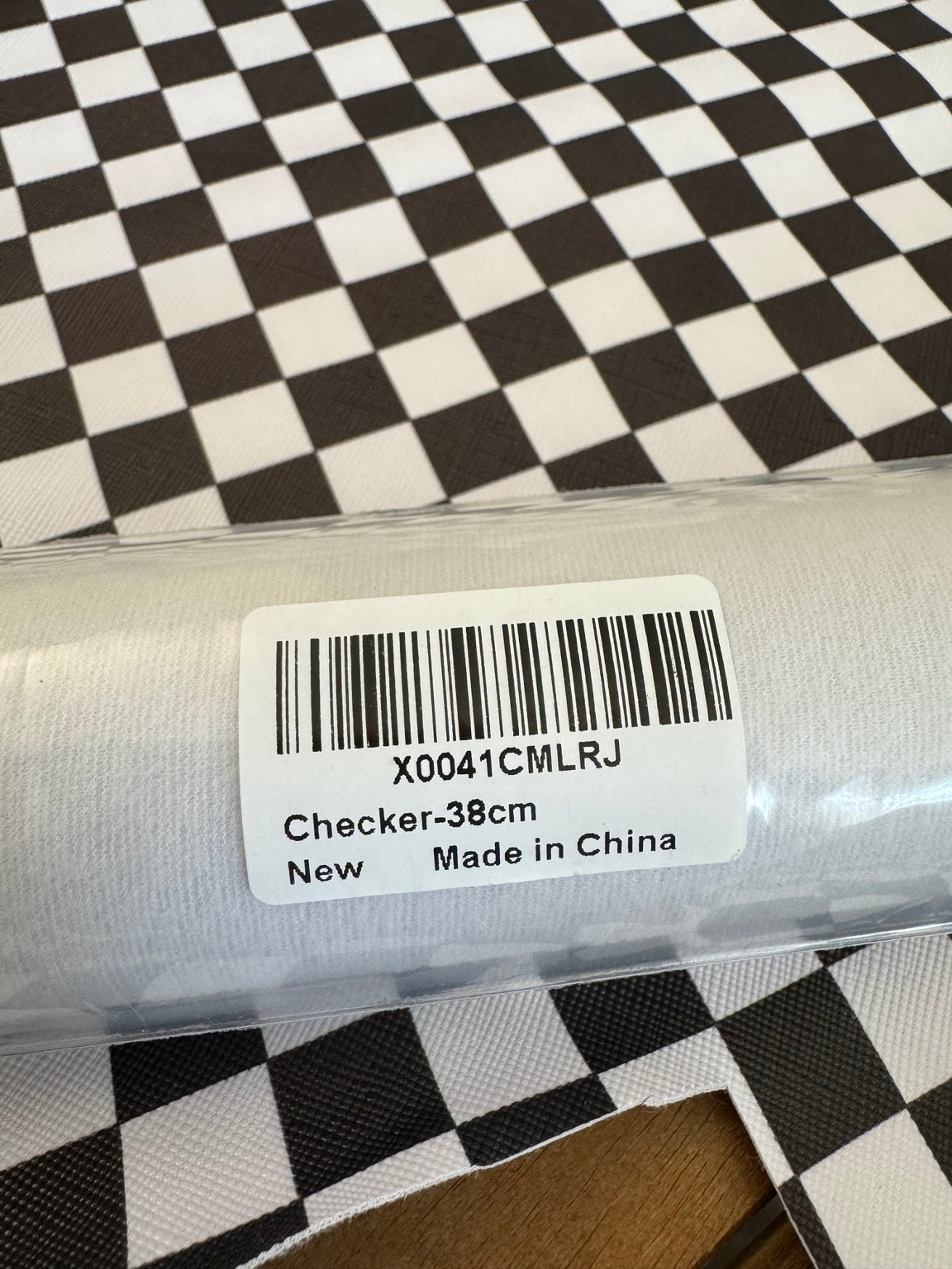 Black and white checker faux leather roll and matching remnant