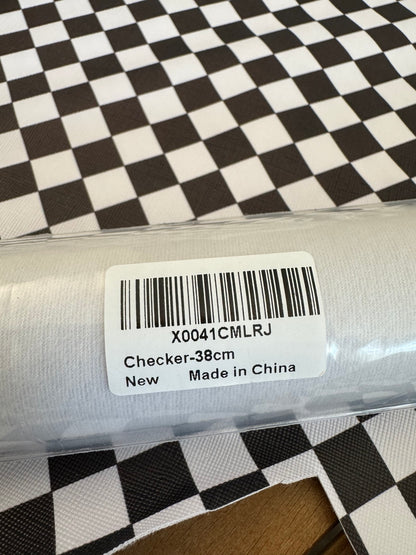 Black and white checker faux leather roll and matching remnant