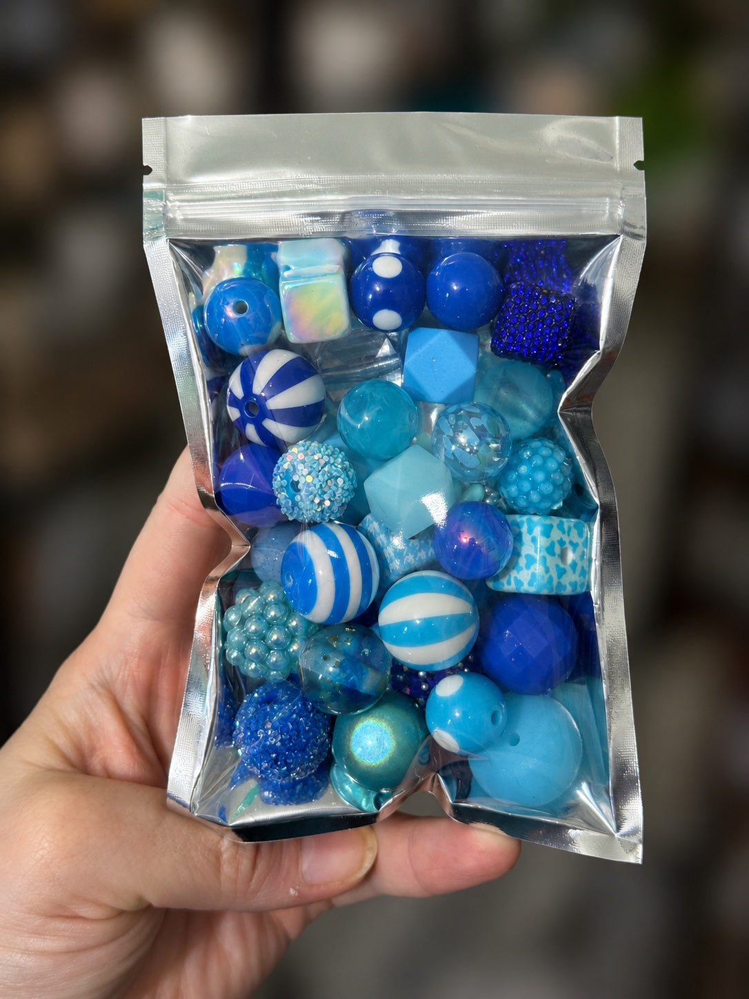 Blue 35-piece color-themed bead bag with assorted acrylic and silicone beads in mixed shapes and sizes