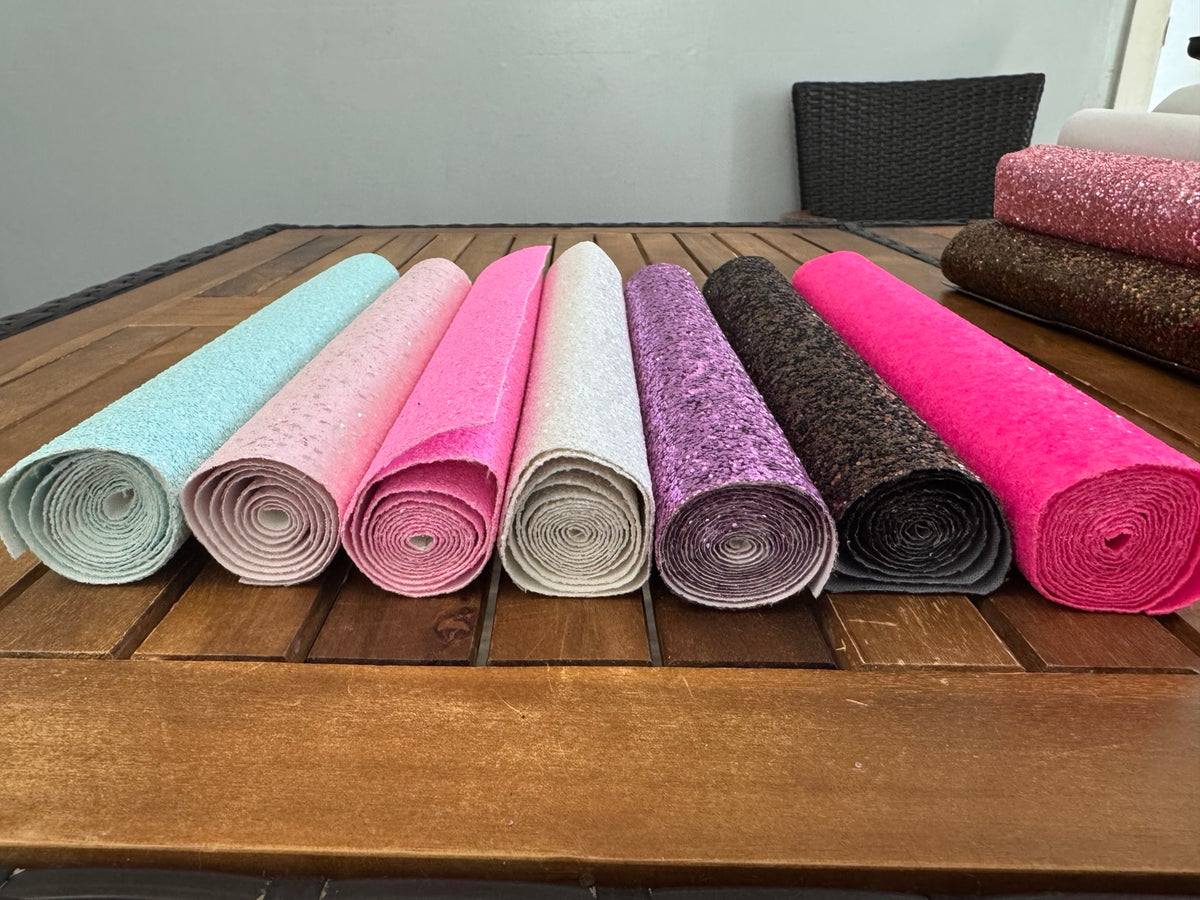 Chunky glitter faux leather remnant rolls in Ice Blue, Baby Pink, Pink, White, Lilac, Brown and Neon Pink