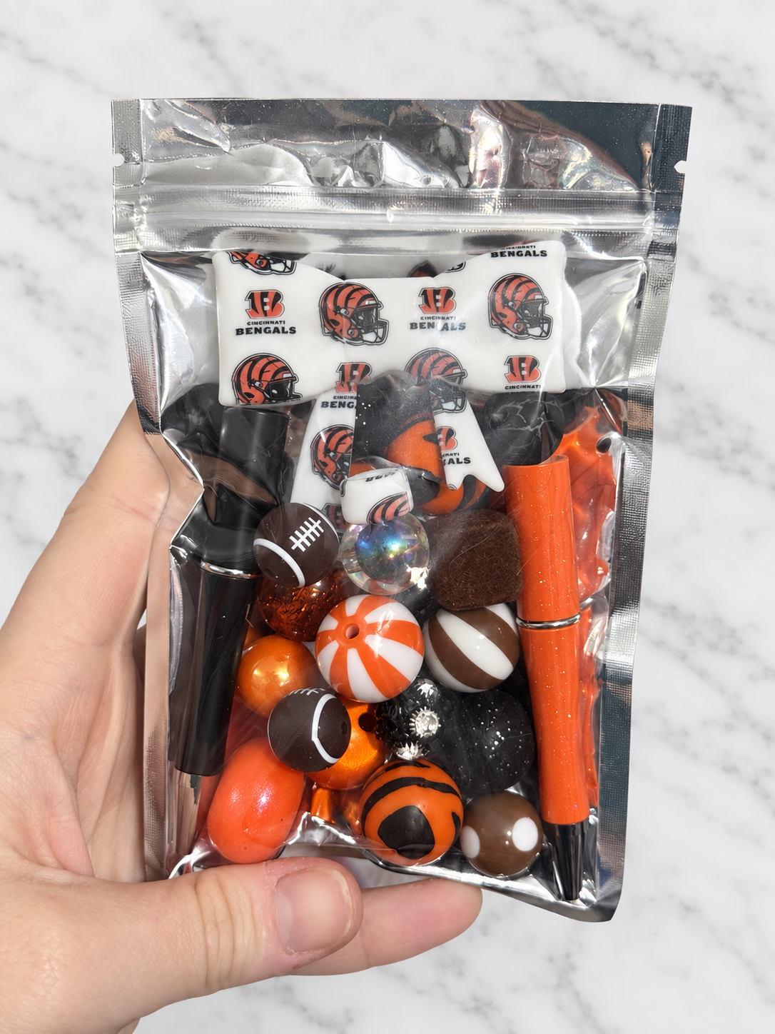 Orange End Zone – First Dibs Curated Pen + Bow Bead Bag