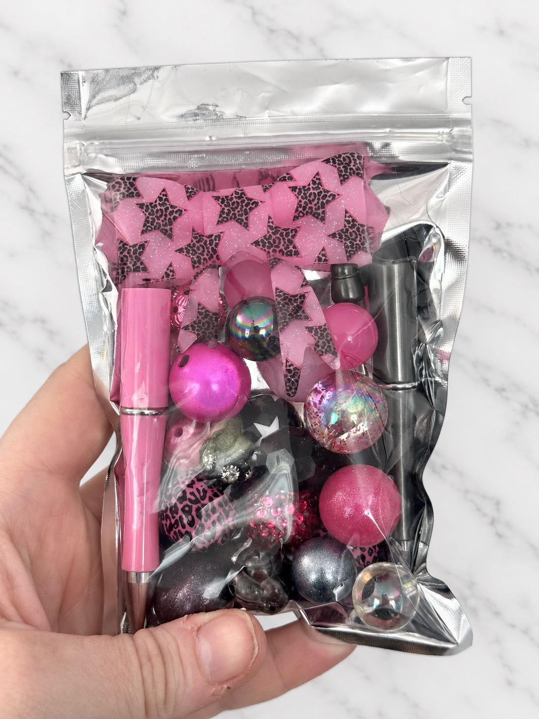 Pink Wild Stars First Dibs curated pen and bow bead bag