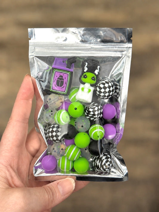 30+ piece lime green purple black and white gothic silicone bead mix with two bride-themed focal beads