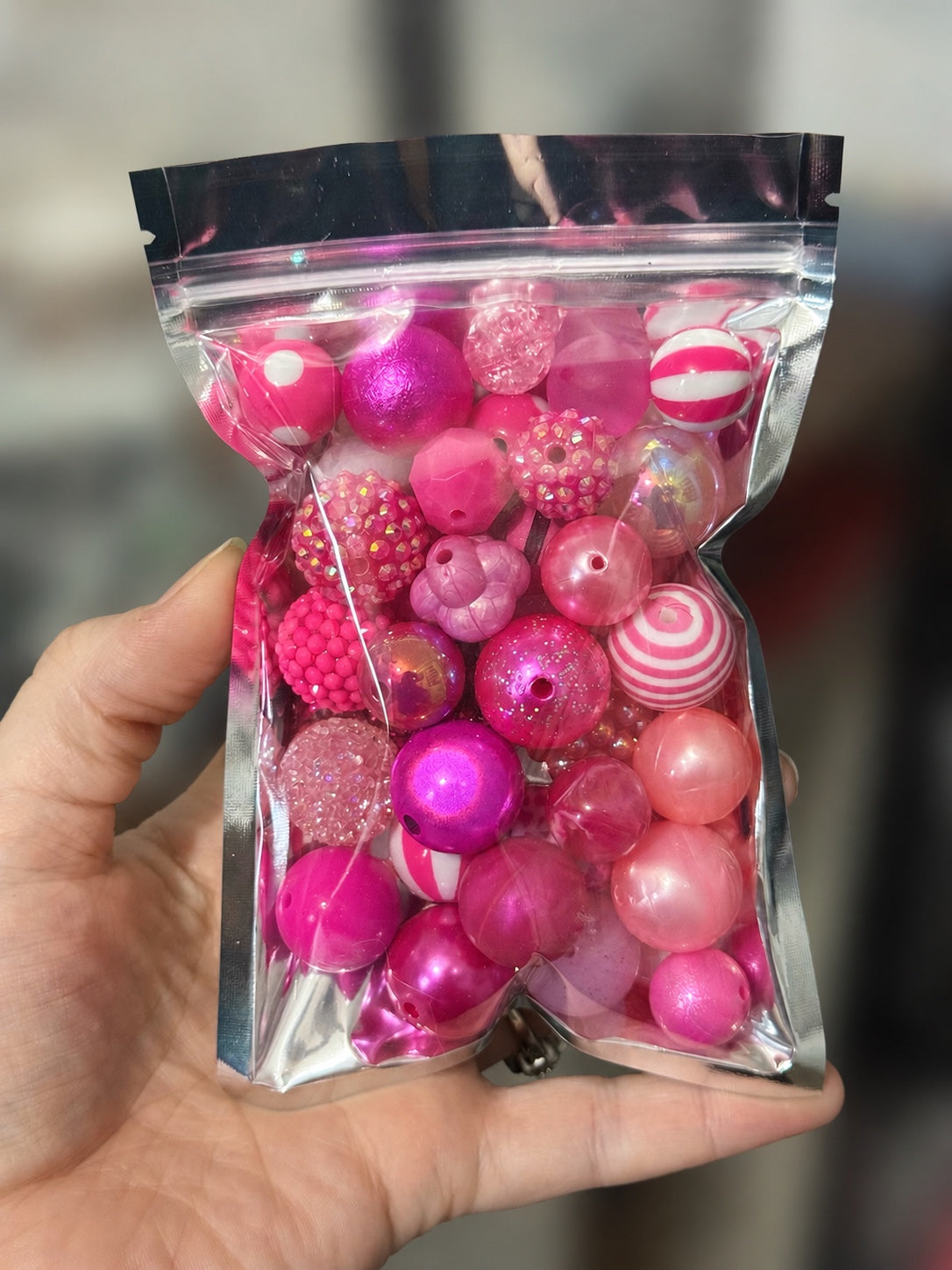 Pink 35-piece color-themed bead bag with assorted acrylic and silicone beads in mixed shapes and sizes