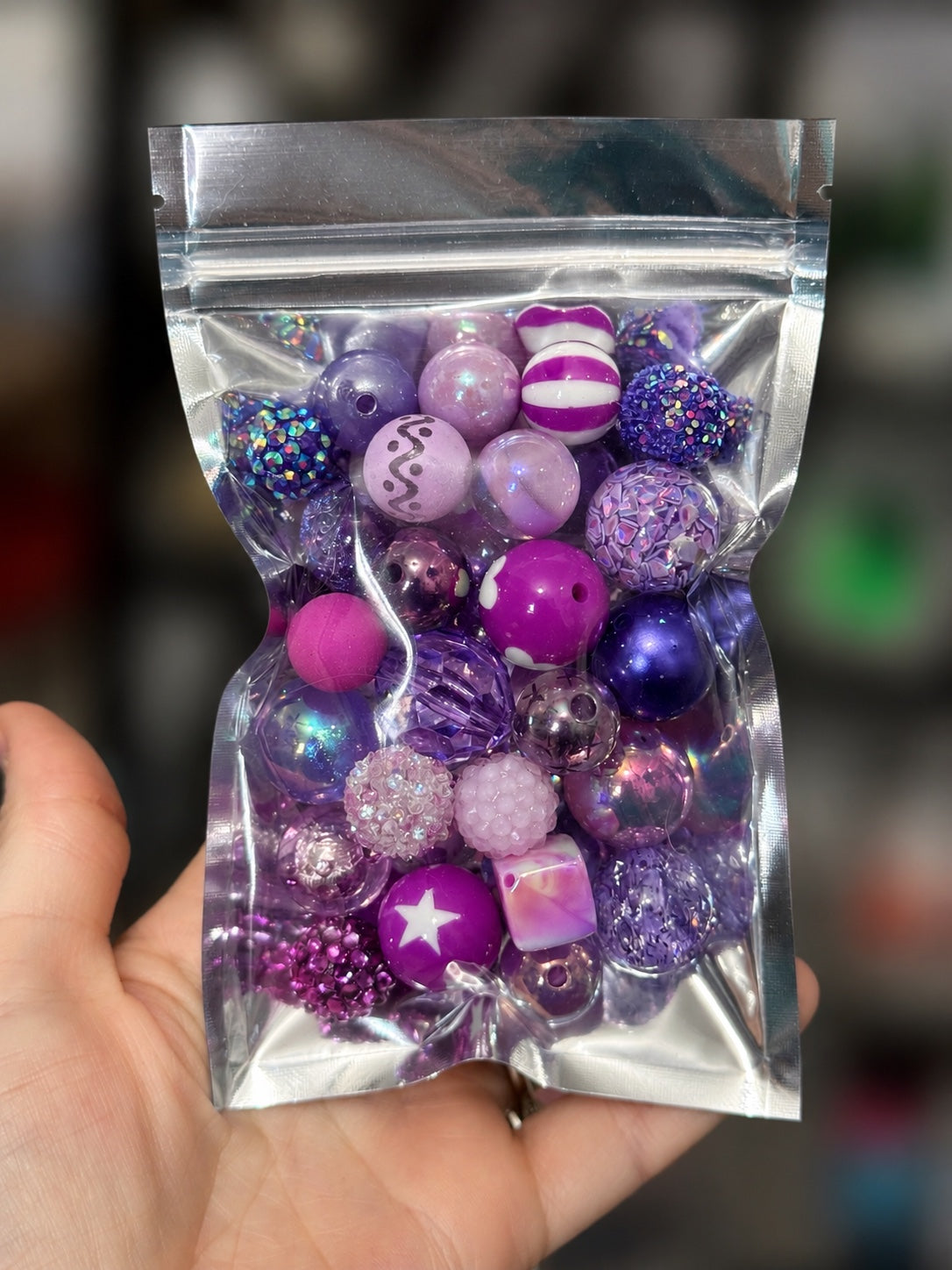 Purple 35-piece color-themed bead bag with assorted acrylic and silicone beads in mixed shapes and sizes