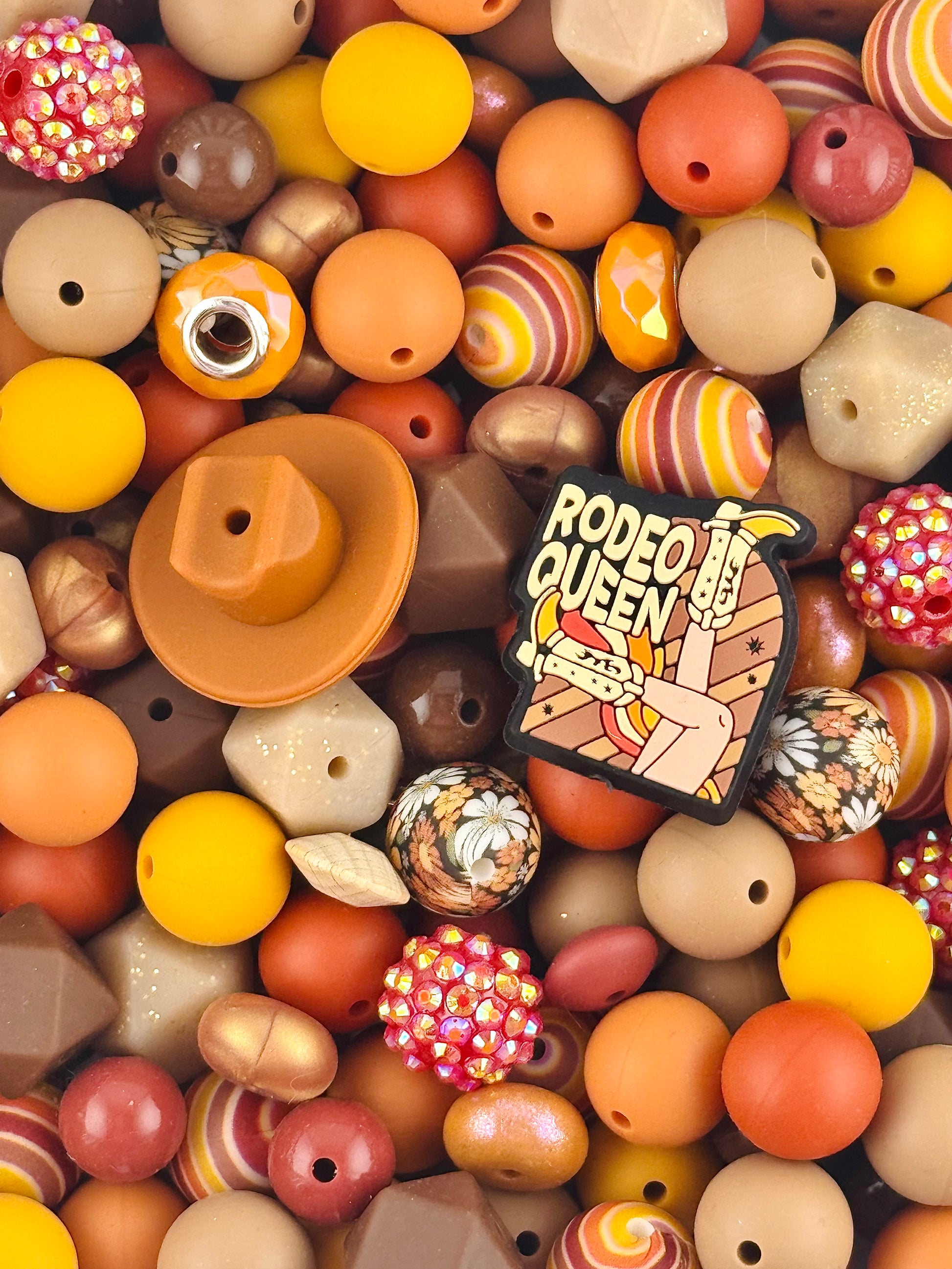 Western rodeo queen silicone bead mix featuring cowgirl focal, cowboy hat bead, warm brown tan and mustard beads for wristlets, lanyards and DIY keychains
