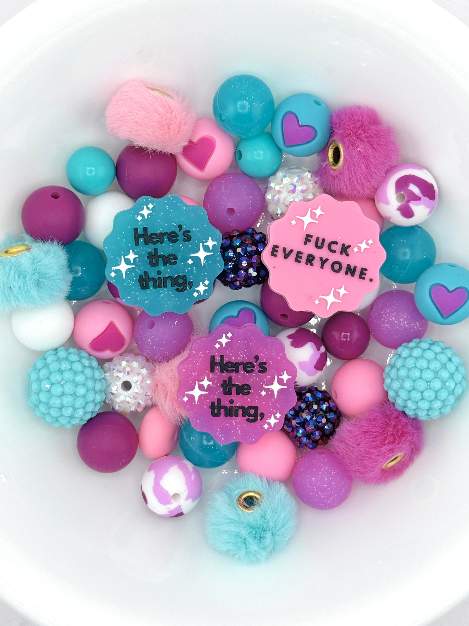 Colorful silicone bead mix featuring sassy quote focal beads, rhinestone accents, and fuzzy beads for bold wristlets and keychains