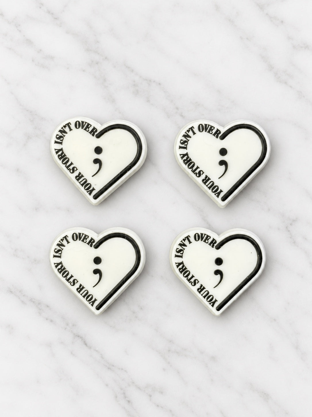Your Story Isn’t Over black and white heart silicone focals on white marble